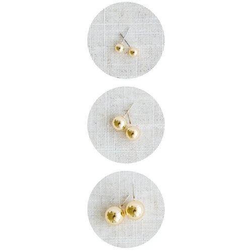 Shiny gold Grenada earrings in all three sizes.