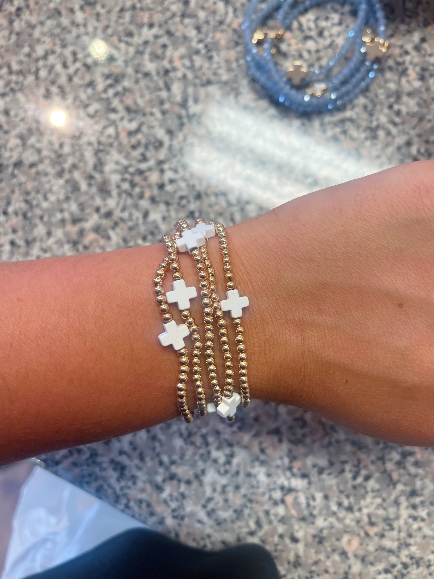 Gold Tone Beaded Stretch Bracelet Set Featuring Dainty Cross Beads